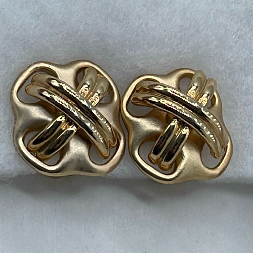 Vintage Cross matte shiny gold colored metal clip earrings.